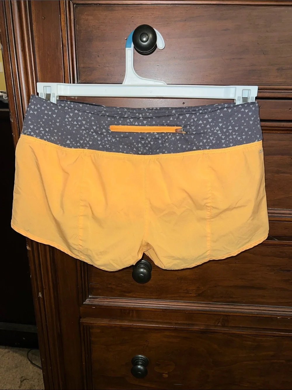 Nike Women's Orange Running Shorts with Gray Patterned Waistband